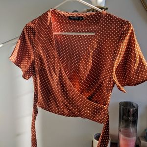 Rust orange polka dot wrap top